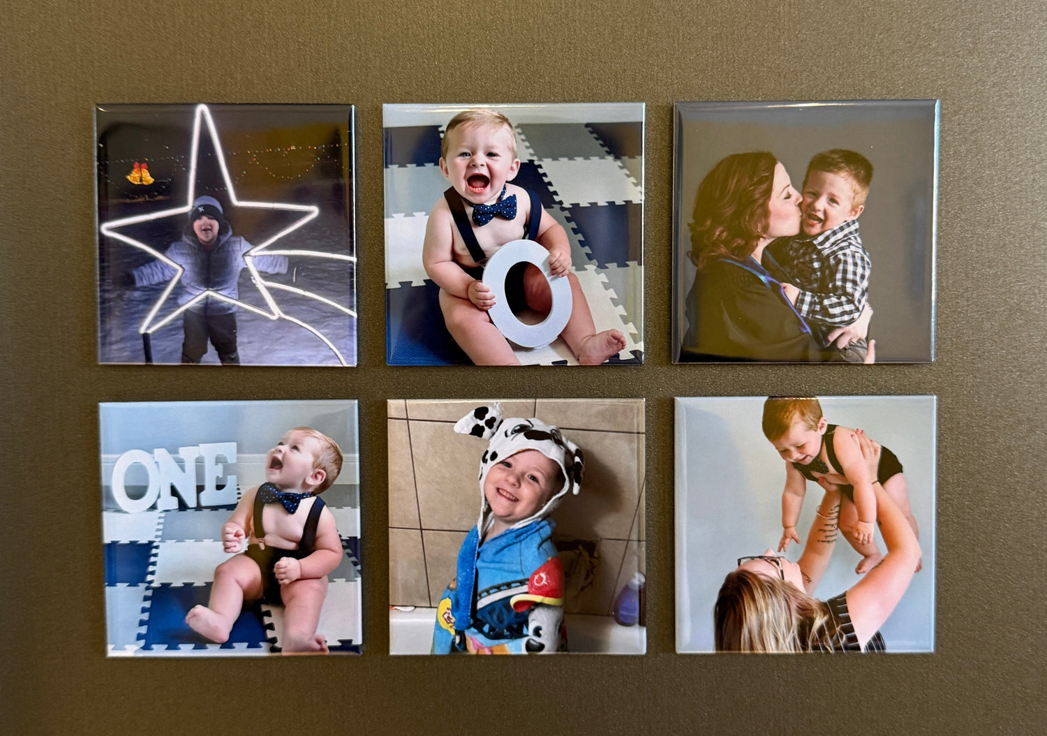 Custom photo magnets with family photos styled on a warm background