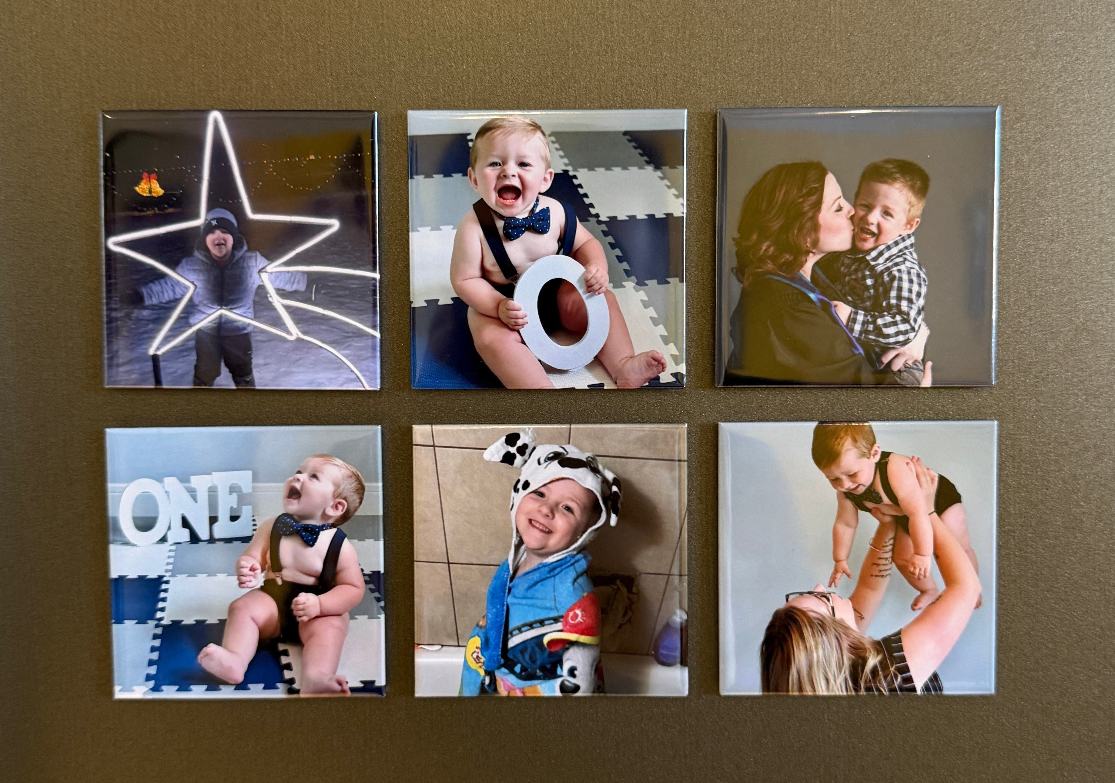 Custom photo magnets with family photos styled on a warm background